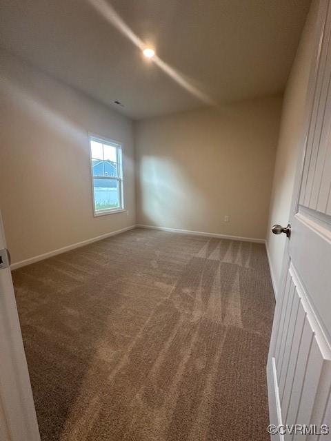 7079 Hepworth Dr, Henrico, VA 23231 - carpeted empty room featuring baseboards