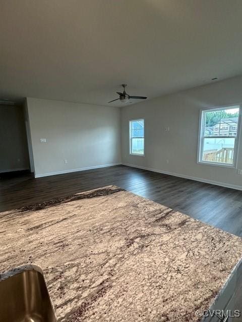 7079 Hepworth Dr, Henrico, VA 23231 - unfurnished living room with ceiling fan and dark wood finished floors