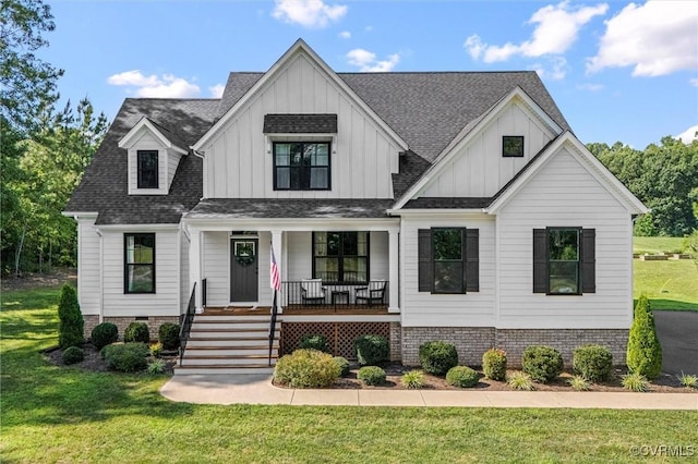 3616 Bonnies Way, Powhatan, VA 23139 - modern farmhouse style home featuring covered porch, board and batten siding, and roof with shingles