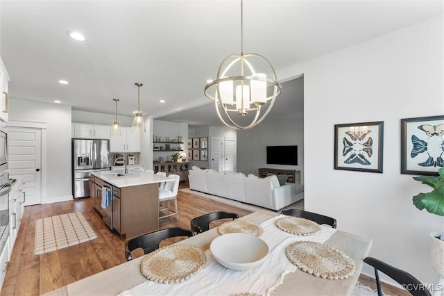 3616 Bonnies Way, Powhatan, VA 23139 - dining space with a chandelier, dark wood-style flooring, and recessed lighting