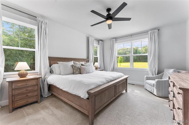 3616 Bonnies Way, Powhatan, VA 23139 - bedroom with multiple windows, light colored carpet, and ceiling fan