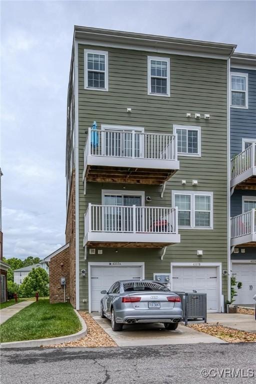 4357 Saunders Station Loop Unit B, Henrico, VA 23233 - view of property with an attached garage and driveway