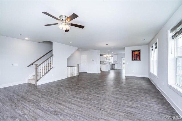 4357 Saunders Station Loop Unit B, Henrico, VA 23233 - unfurnished living room featuring dark wood finished floors, ceiling fan, a chandelier, recessed lighting, and stairs