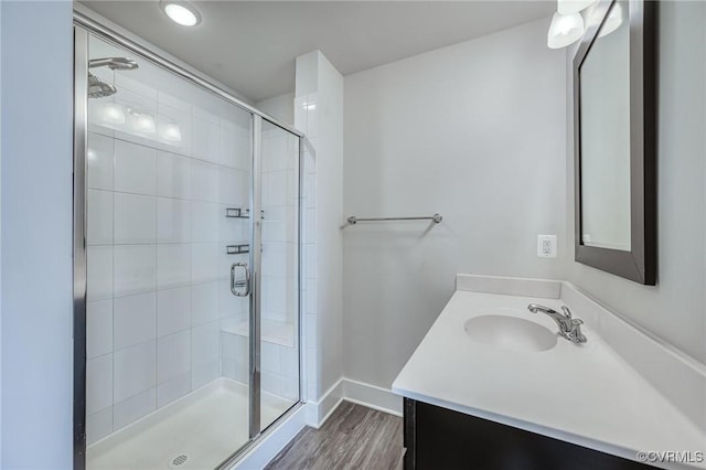 4357 Saunders Station Loop Unit B, Henrico, VA 23233 - full bathroom featuring vanity, a stall shower, and wood finished floors