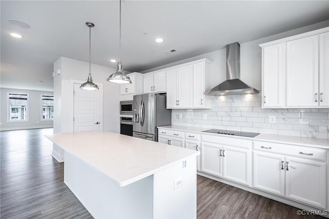 4357 Saunders Station Loop Unit B, Henrico, VA 23233 - kitchen featuring wall chimney range hood, appliances with stainless steel finishes, dark wood-style floors, light countertops, and recessed lighting