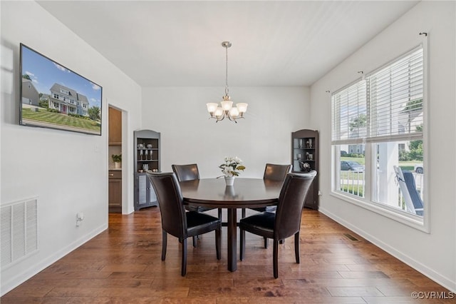 17018 Westervelt Ct, Chesterfield, VA 23120 - dining space featuring a chandelier and dark wood-style flooring