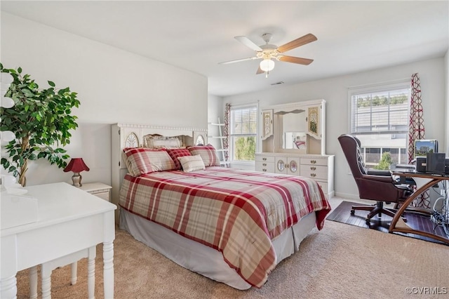 17018 Westervelt Ct, Chesterfield, VA 23120 - carpeted bedroom with multiple windows, ceiling fan, and a desk