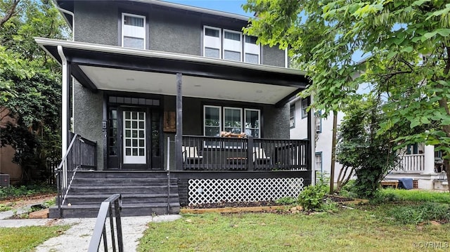 1323 Avondale Ave, Richmond, VA 23227 - view of front of house with a porch and stucco siding