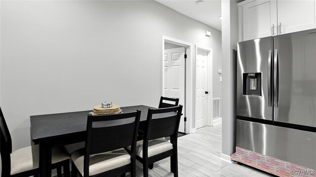 1323 Avondale Ave, Richmond, VA 23227 - dining room featuring baseboards