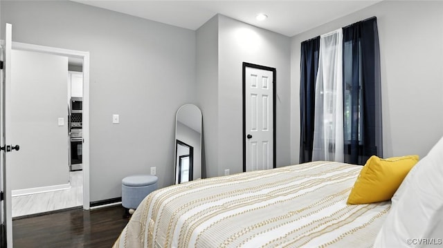 1323 Avondale Ave, Richmond, VA 23227 - bedroom with dark wood finished floors and recessed lighting