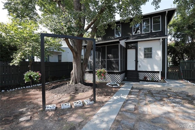 1323 Avondale Ave, Richmond, VA 23227 - view of front of home featuring entry steps and a sunroom