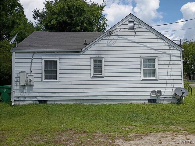 32 Seaboard St, Petersburg, VA 23803 - view of home's exterior with a yard, crawl space, and a shingled roof