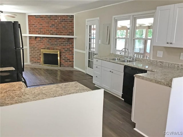 5206 Hallmark Dr, Chesterfield, VA 23234 - kitchen featuring black appliances, dark wood finished floors, ceiling fan, white cabinets, and a fireplace