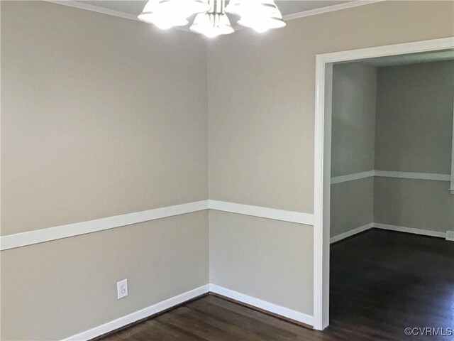 5206 Hallmark Dr, Chesterfield, VA 23234 - spare room with ornamental molding and dark wood-style flooring