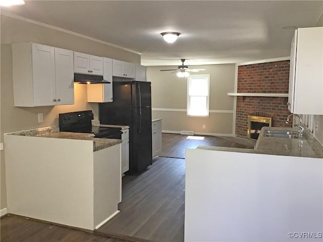 5206 Hallmark Dr, Chesterfield, VA 23234 - kitchen featuring under cabinet range hood, ceiling fan, dark wood-style flooring, and white cabinetry
