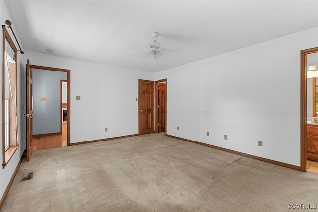 6768 Poplar Woods Ct, Quinton, VA 23141 - unfurnished room with a ceiling fan, light carpet, and plenty of natural light