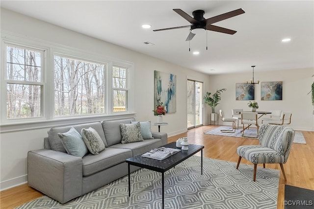 4029 Old Buckingham Rd, Powhatan, VA 23139 - living area with plenty of natural light, light wood-type flooring, a chandelier, a ceiling fan, and recessed lighting