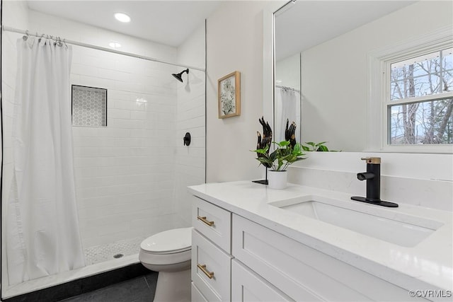 4029 Old Buckingham Rd, Powhatan, VA 23139 - bathroom with vanity, a tile shower, recessed lighting, and tile patterned flooring