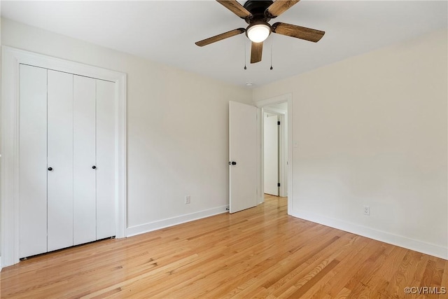 4029 Old Buckingham Rd, Powhatan, VA 23139 - unfurnished bedroom featuring light wood-style flooring, a closet, and a ceiling fan