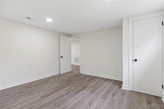 4029 Old Buckingham Rd, Powhatan, VA 23139 - unfurnished bedroom with wood finished floors and recessed lighting