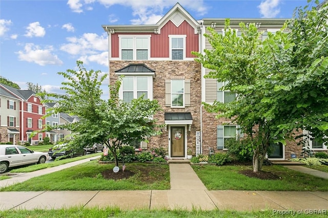 4217 Pillar, Williamsburg, VA 23188 - townhome / multi-family property with stone siding, board and batten siding, and a residential view