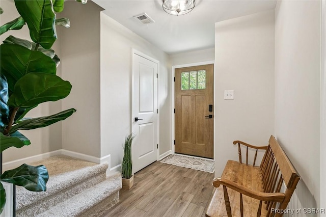 4217 Pillar, Williamsburg, VA 23188 - entrance foyer featuring wood finished floors and stairway