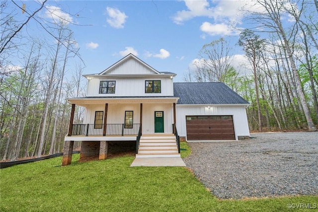 2467 Judes Ferry Rd, Powhatan, VA 23139 - modern farmhouse with a porch, an attached garage, gravel driveway, a front yard, and roof with shingles