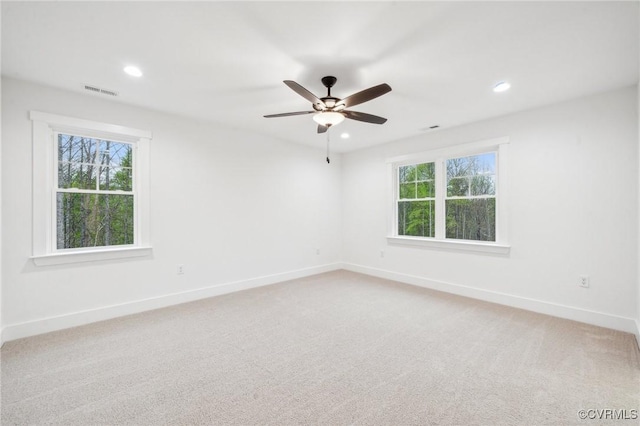 2467 Judes Ferry Rd, Powhatan, VA 23139 - spare room featuring healthy amount of natural light, light carpet, ceiling fan, and recessed lighting