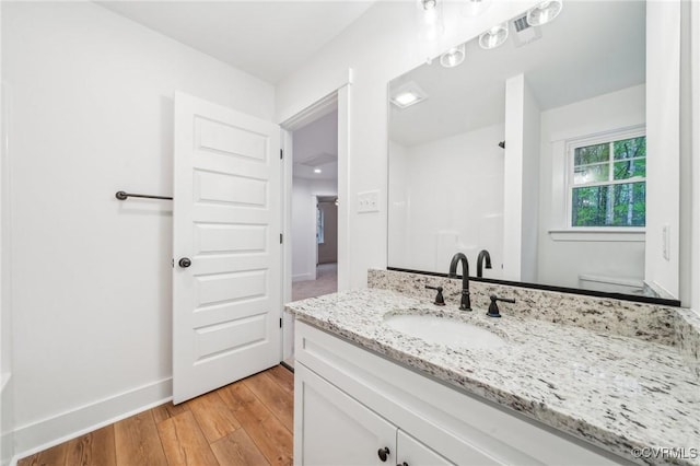 2467 Judes Ferry Rd, Powhatan, VA 23139 - bathroom with vanity and wood finished floors