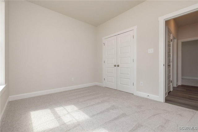 706 S Main St, Blackstone, VA 22824 - unfurnished bedroom featuring carpet and a closet