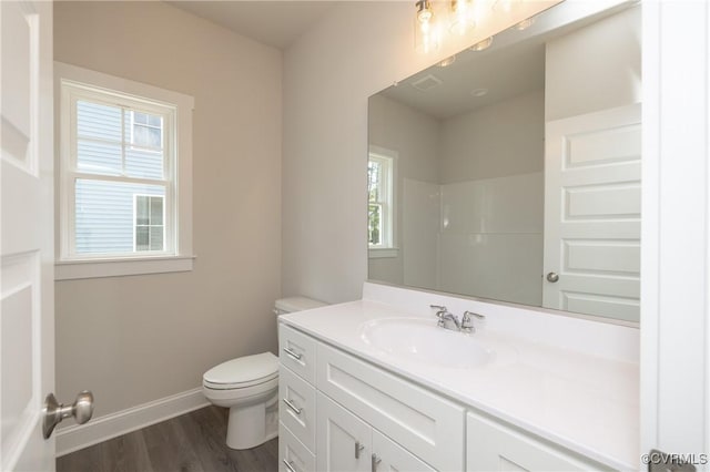706 S Main St, Blackstone, VA 22824 - full bath featuring vanity, wood finished floors, and a shower