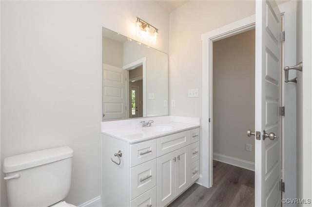 706 S Main St, Blackstone, VA 22824 - bathroom featuring vanity and wood finished floors