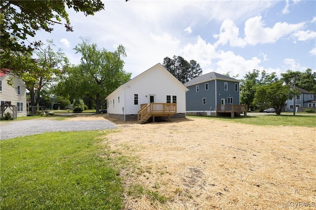 706 S Main St, Blackstone, VA 22824 - view of side of home featuring a wooden deck, a lawn, and crawl space