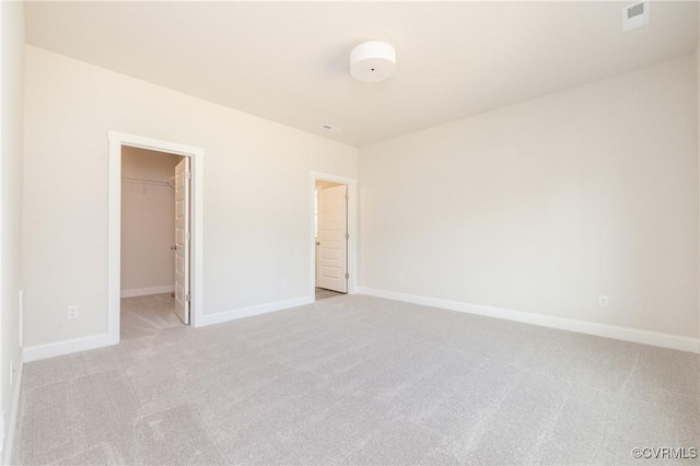706 S Main St, Blackstone, VA 22824 - spare room featuring light carpet and baseboards