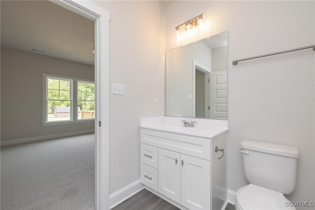 706 S Main St, Blackstone, VA 22824 - half bathroom featuring vanity and toilet