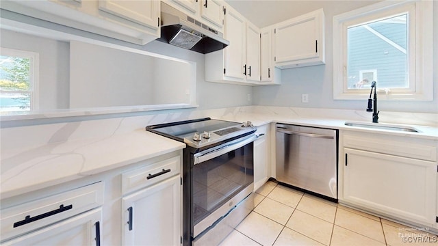 7816 Camolin Ct, Henrico, VA 23228 - kitchen featuring stainless steel appliances, under cabinet range hood, white cabinets, light tile patterned floors, and light stone countertops