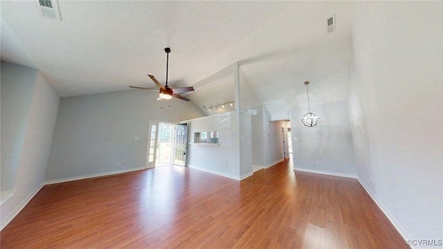 7816 Camolin Ct, Henrico, VA 23228 - unfurnished living room featuring ceiling fan, light wood-style flooring, high vaulted ceiling, and a chandelier
