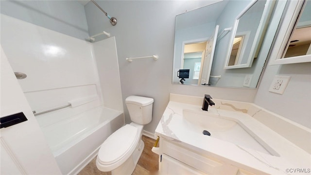 7816 Camolin Ct, Henrico, VA 23228 - full bathroom featuring vanity, washtub / shower combination, and wood finished floors