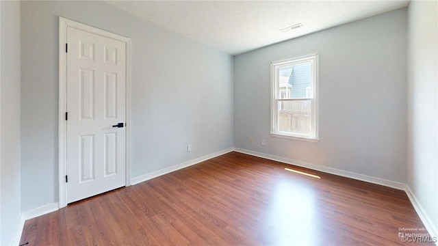 7816 Camolin Ct, Henrico, VA 23228 - unfurnished room with wood finished floors and baseboards