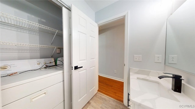 7816 Camolin Ct, Henrico, VA 23228 - washroom with washer / dryer and light wood-style floors