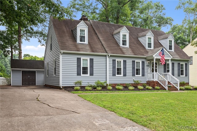 5307 Dermotte Ln, North Chesterfield, VA 23237 - cape cod-style house with an outdoor structure, a chimney, a front yard, and a garage