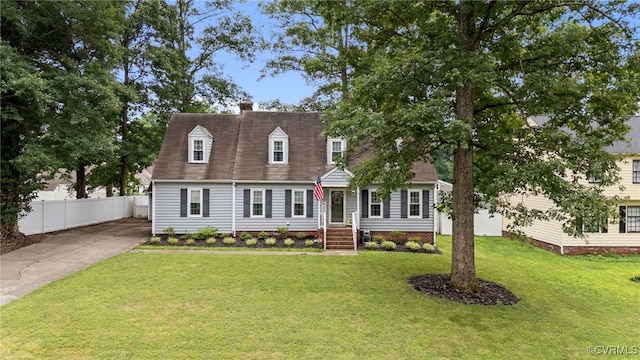 5307 Dermotte Ln, North Chesterfield, VA 23237 - cape cod house with a chimney, concrete driveway, and roof with shingles