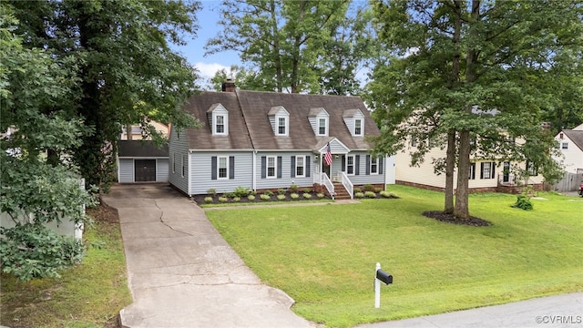 5307 Dermotte Ln, North Chesterfield, VA 23237 - cape cod home with a chimney, concrete driveway, an outdoor structure, and a front yard