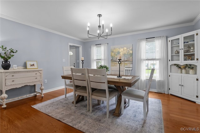 5307 Dermotte Ln, North Chesterfield, VA 23237 - dining room featuring a chandelier, plenty of natural light, ornamental molding, and wood finished floors