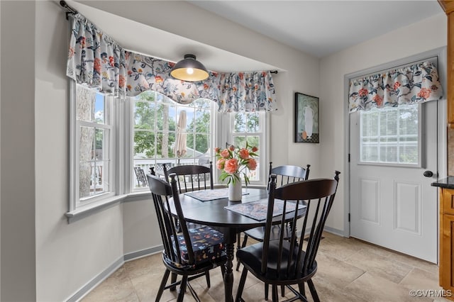 5307 Dermotte Ln, North Chesterfield, VA 23237 - dining area with baseboards