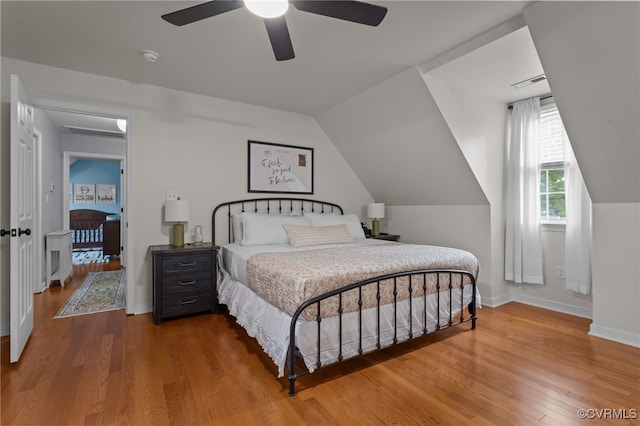 5307 Dermotte Ln, North Chesterfield, VA 23237 - bedroom featuring wood finished floors, vaulted ceiling, and a ceiling fan