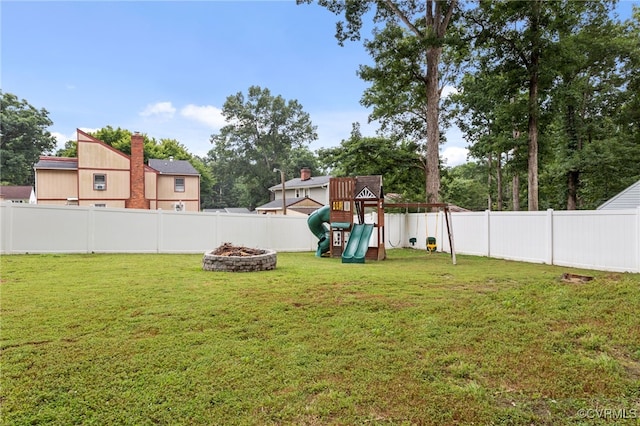 5307 Dermotte Ln, North Chesterfield, VA 23237 - fenced backyard with a playground and a fire pit