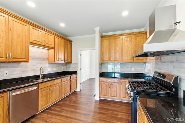 11219 Mill Place Ter, Glen Allen, VA 23060 - kitchen featuring appliances with stainless steel finishes, wall chimney exhaust hood, ornamental molding, tasteful backsplash, and dark wood-type flooring