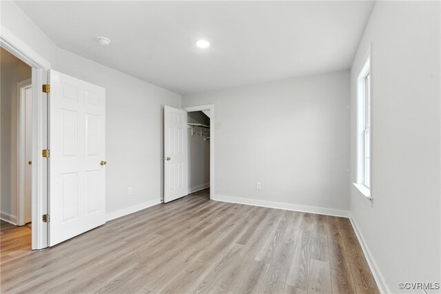 11219 Mill Place Ter, Glen Allen, VA 23060 - unfurnished bedroom featuring light wood finished floors, recessed lighting, and a closet