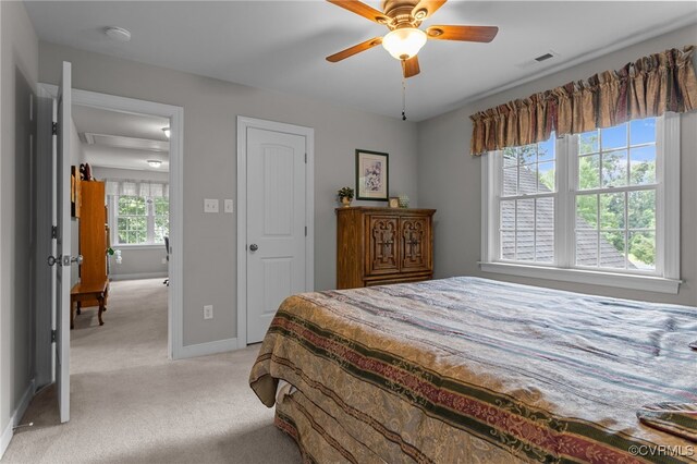 1638 Olde Links Dr, Powhatan, VA 23139 - bedroom with light colored carpet and ceiling fan